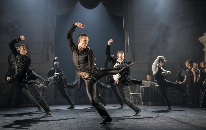 Dark and dangerous seducer: The Stranger (Will Bozier) dominates the balll. Image by Johan Persson.